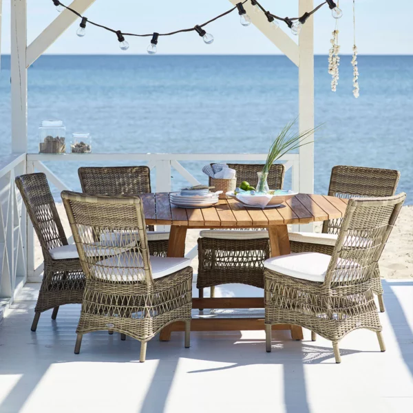 GEORGE -  Table de repas ronde en teck par SIKA DESIGN